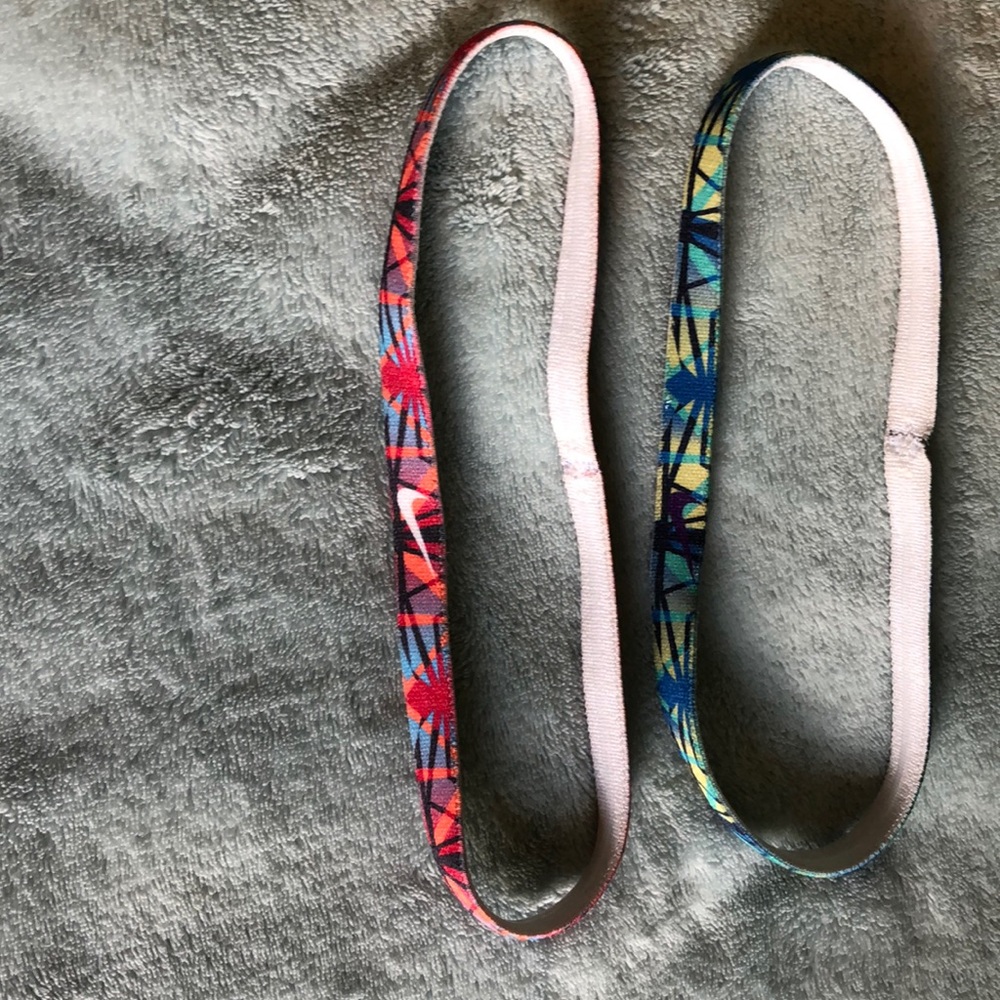 Two never worn Nike headbands